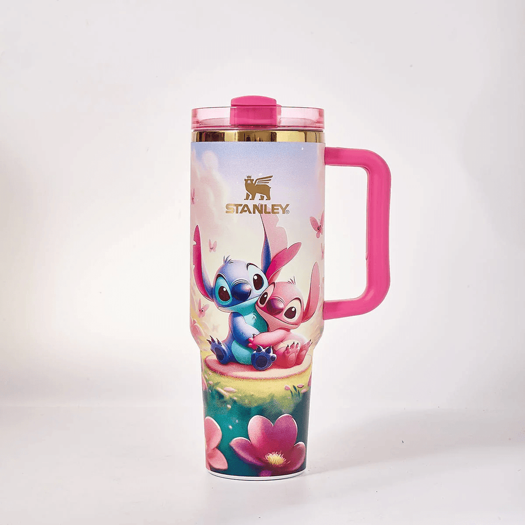 STANLEY Stitch and Angel tumbler gift set featuring pastel floral artwork, pink handle, matching gift box, butterfly accents, and insulated large-capacity design.