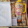 Stanley Winnie the Pooh tumbler with packaging and branded pouch.