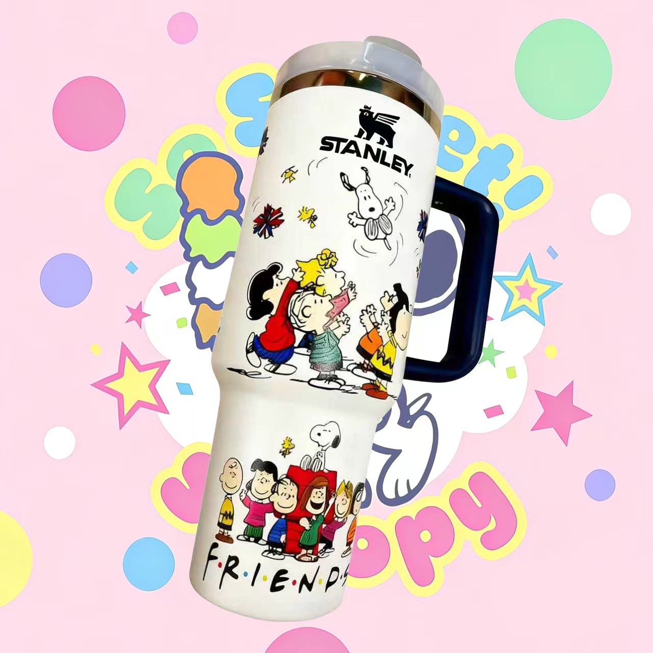 Stanley tumbler with Peanuts character designs on a colorful polka dot background