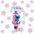 Stanley tumbler with Stitch design on a white background with pink stars