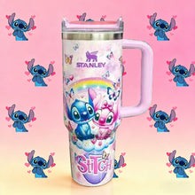 Stanley tumbler with cartoon character design on a pink background