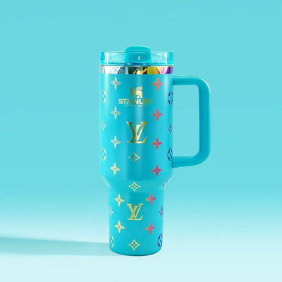 Turquoise tumbler with colorful logos on a light blue background
